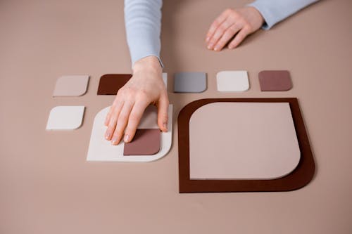 A Person Touching a Nude Color Object