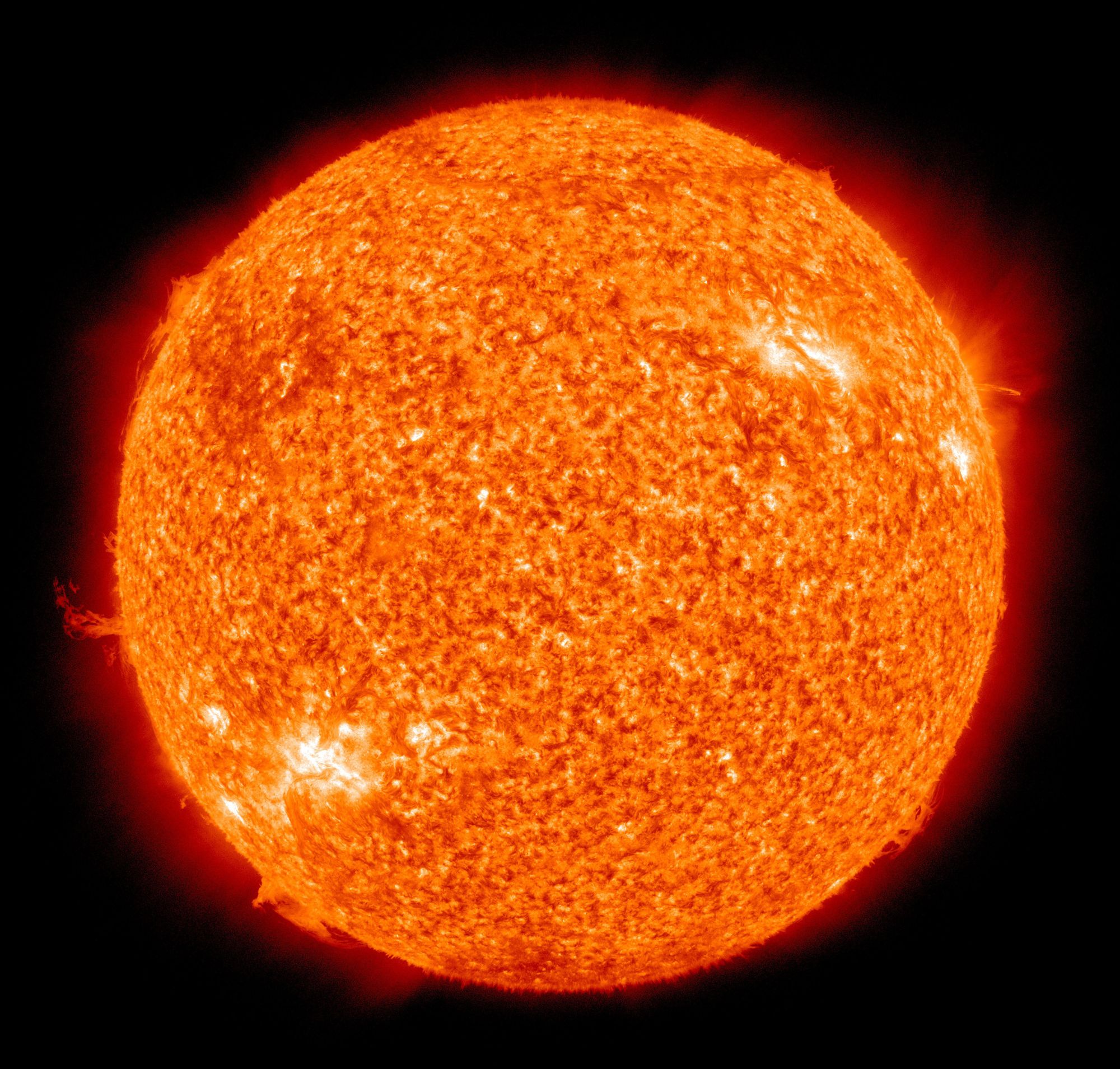 Detailed image of the sun showcasing its fiery surface and glowing edges.