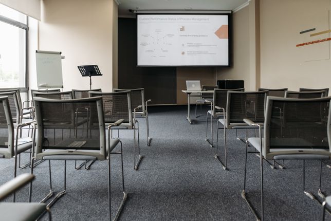 Workplace safety training session projected on a screen  bloodborne pathogens employer compliance in Canada