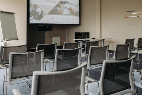 Chairs Arranged inside a Conference Room