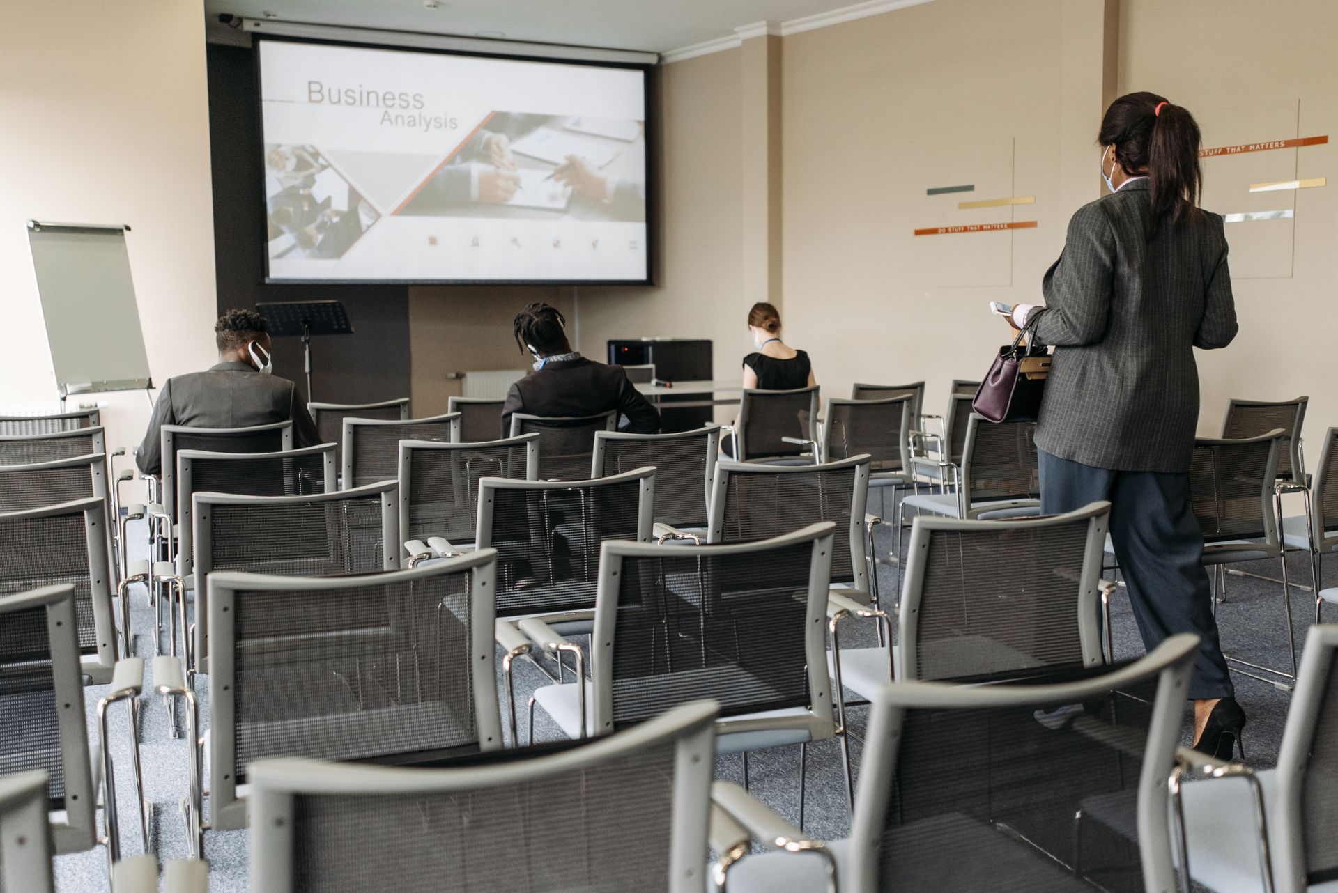 People Sitting inside a Conference Room