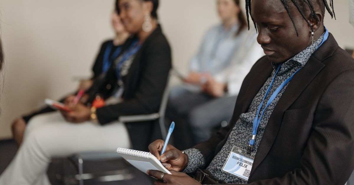 Group of people participating in a skill training workshop at Loveworld Arena in Ho Ghana