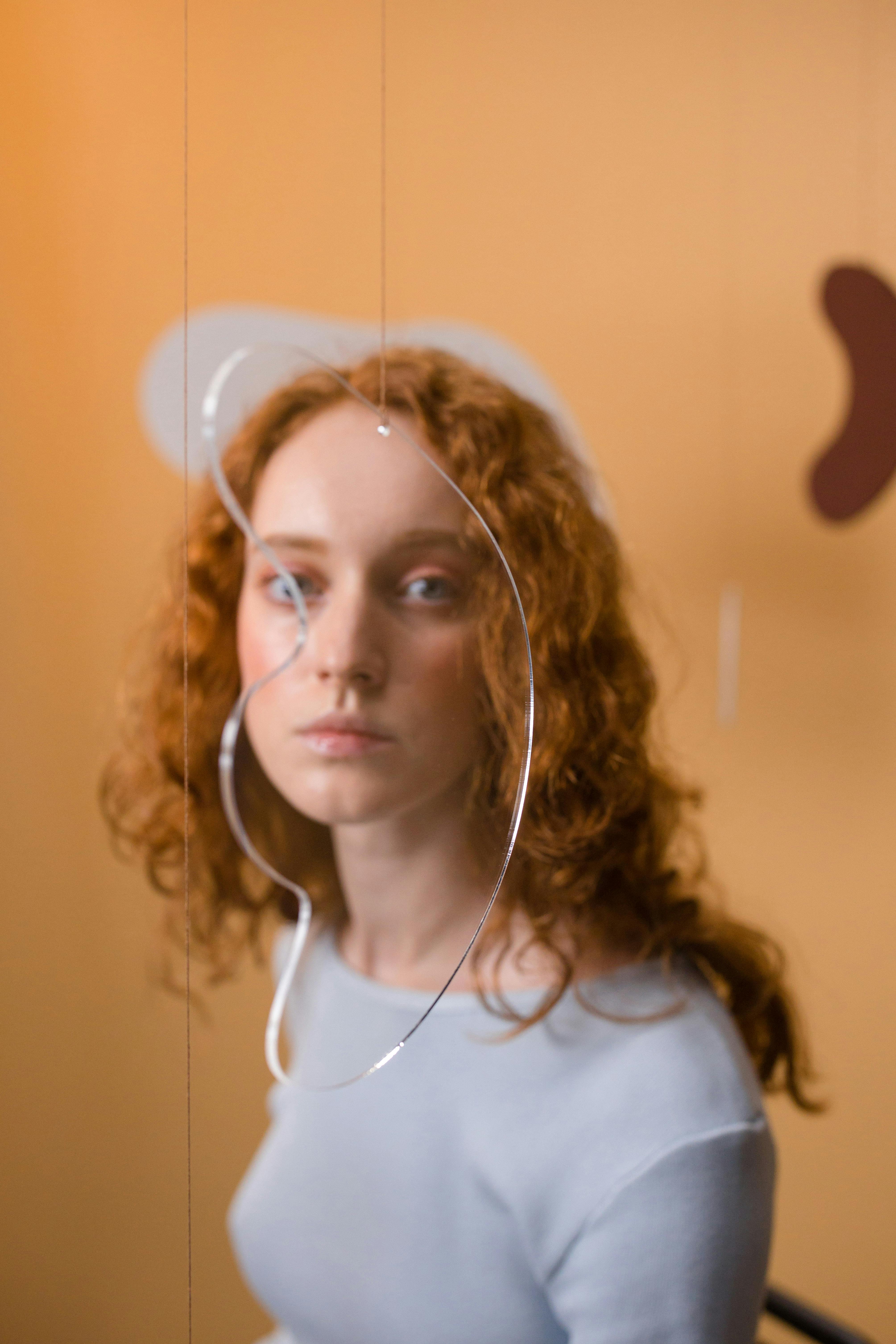 Woman in White ButtonUp Shirt ยท Free Stock Photo