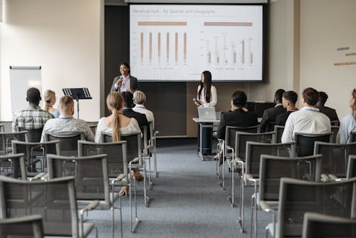 Free Participants Listening to a Speaker Stock Photo