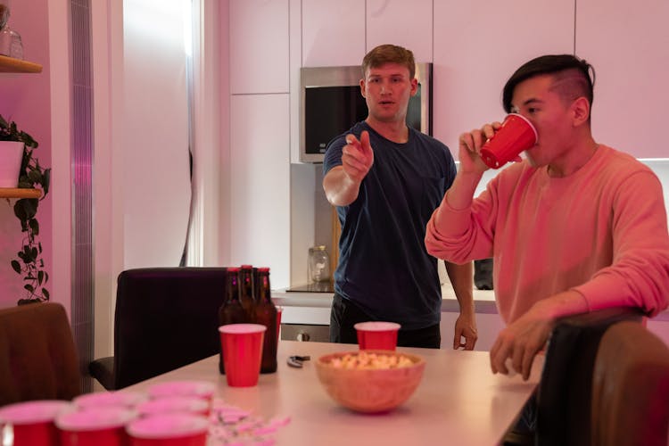 A Man Playing Beer Pong