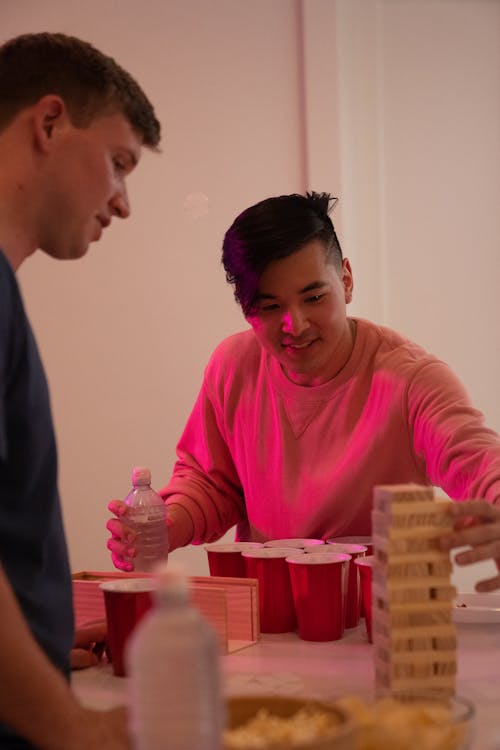 Men Playing Jenga