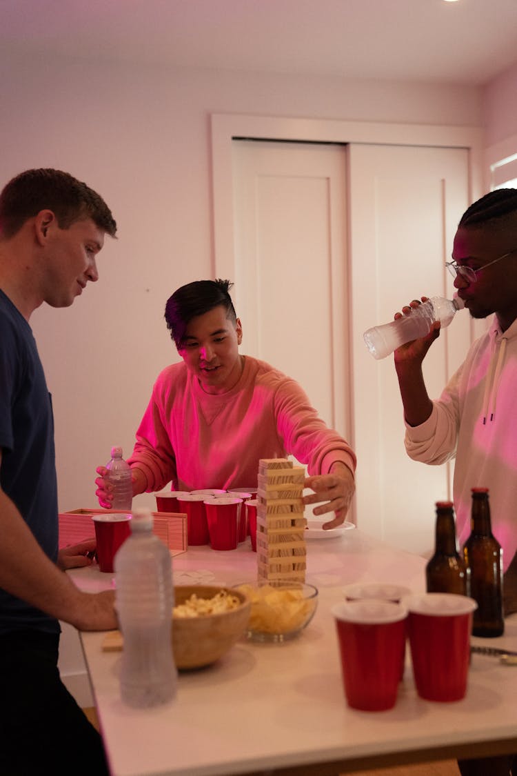 Men Playing Jenga