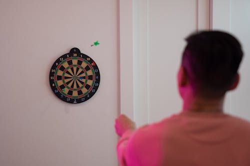 A Person Playing Darts