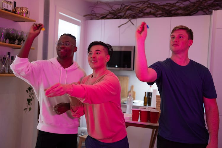 Friends Playing Darts