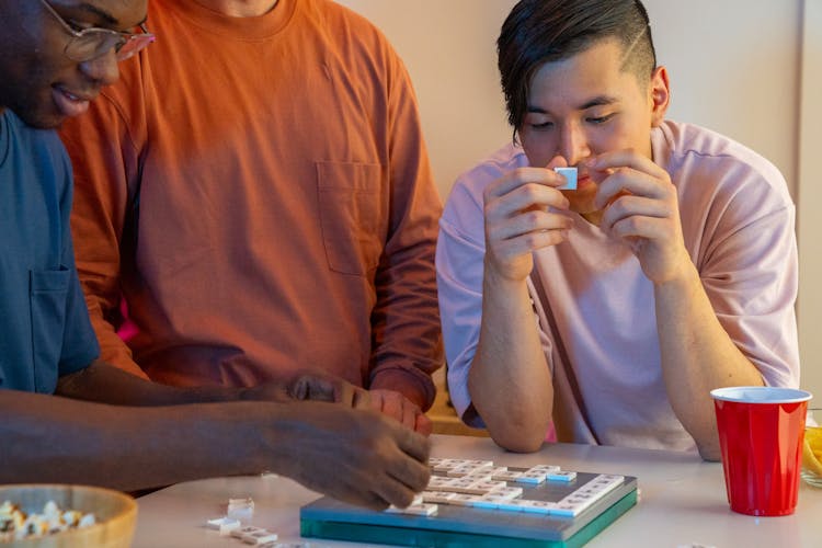 Men Playing Scrabble