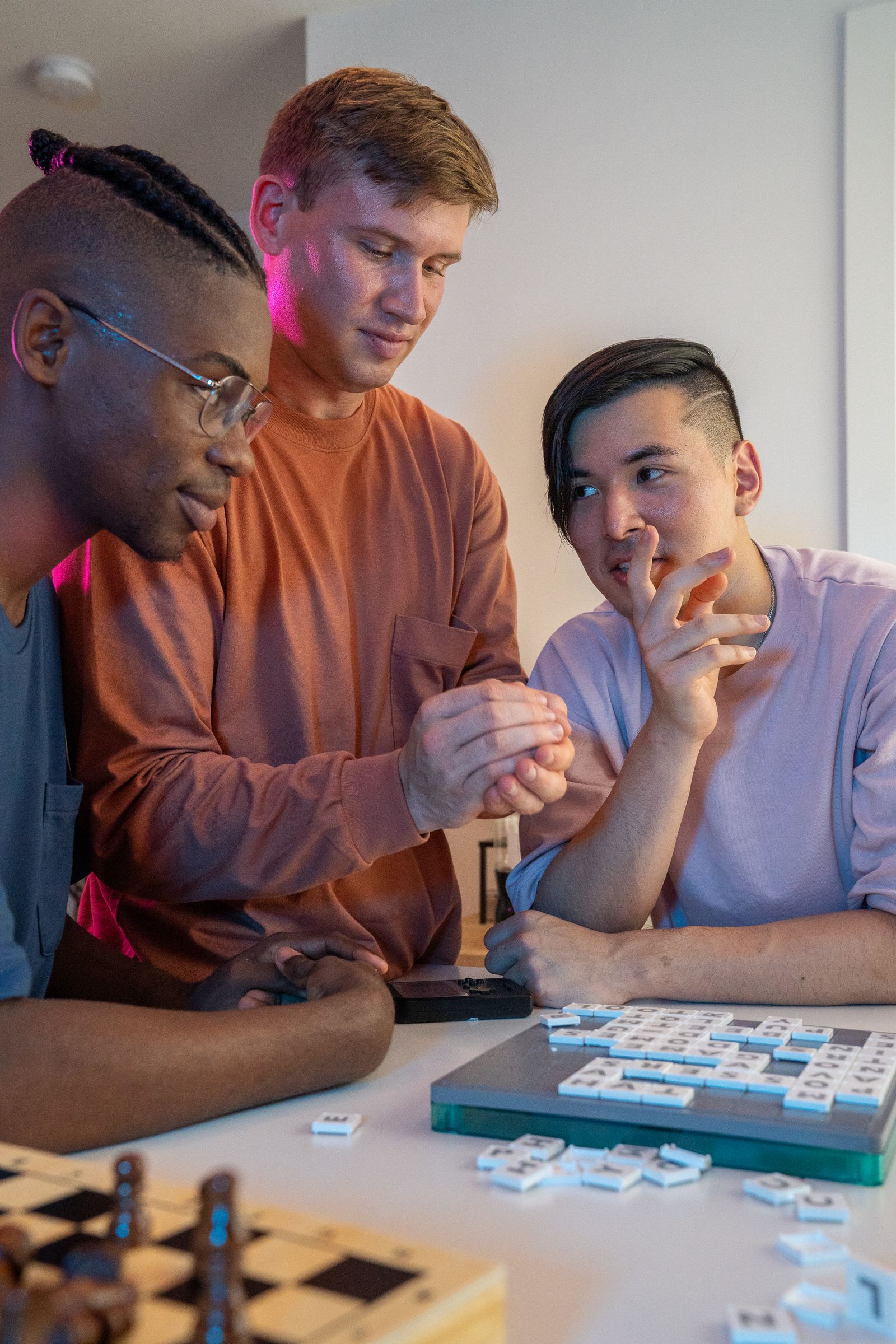 Friends enjoying a board game indoors