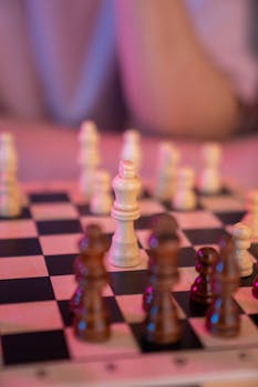 Detailed view of a chessboard showcasing a strategic mid-game setup with wooden pieces.