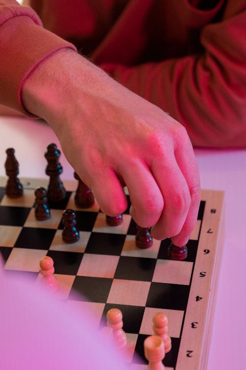 Free A Person Playing Chess Stock Photo