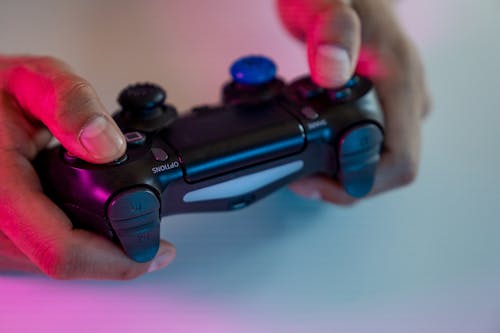 Person Holding a Game Controller