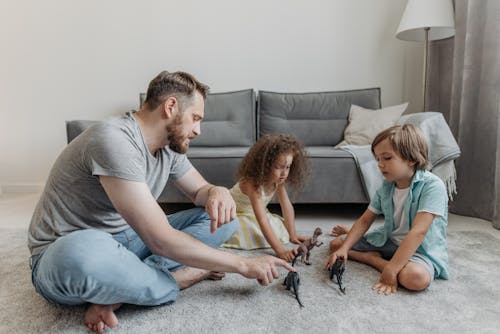 A Father Playing With His Kids 