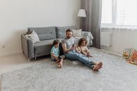 2 Boys Sitting on Gray Couch