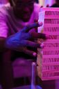 A Man Playing Jenga
