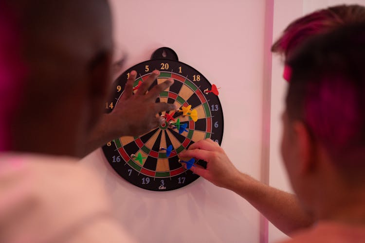 Friends Playing Darts