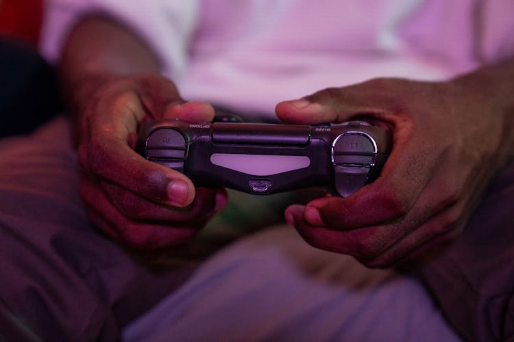 Man Holding Controller