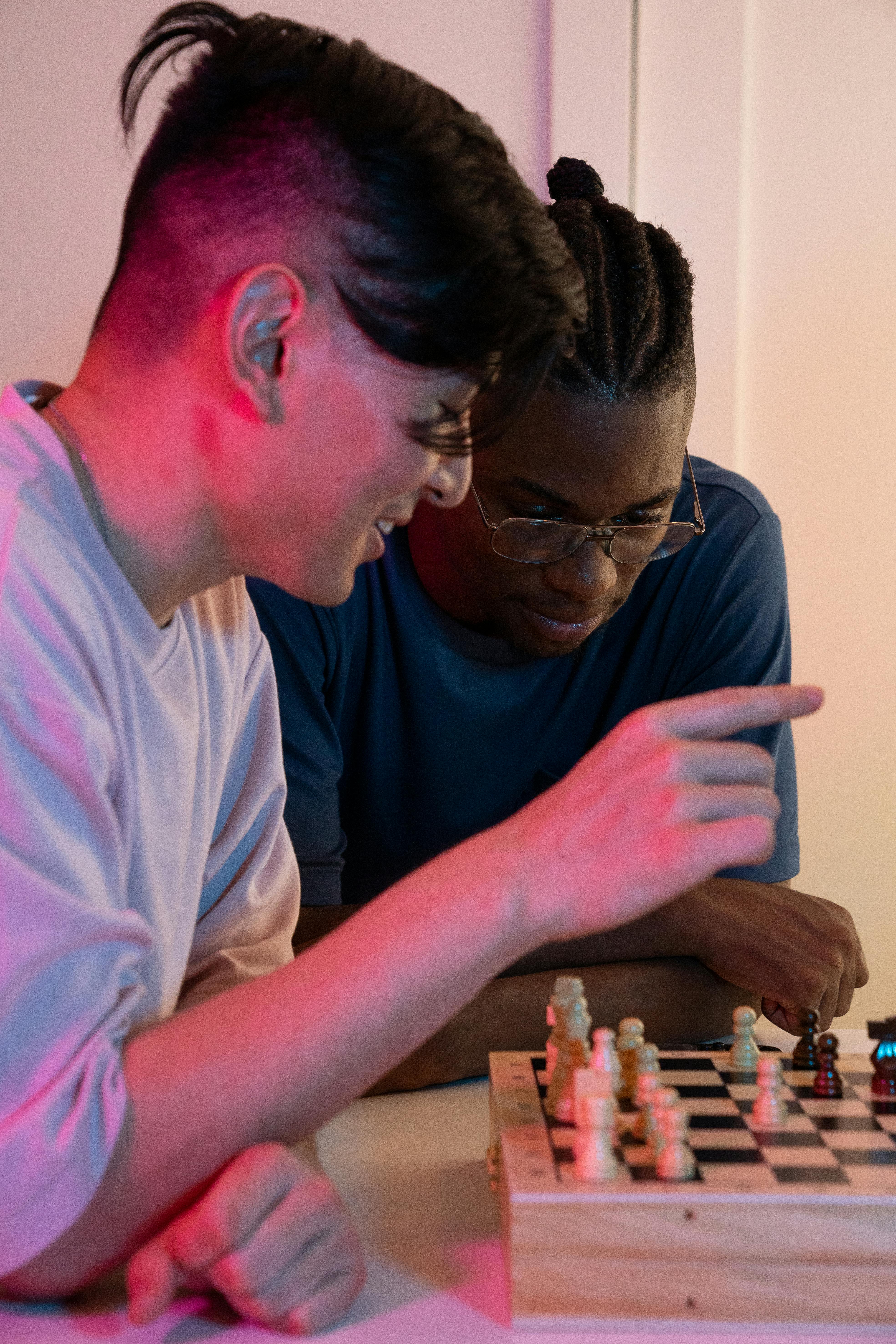 Free Photo  Friends playing chess game