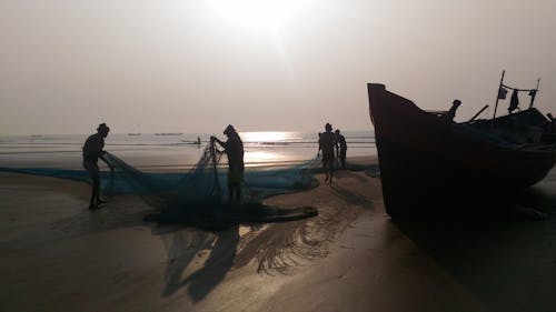 Free stock photo of by the sea, fisherman, morning sun