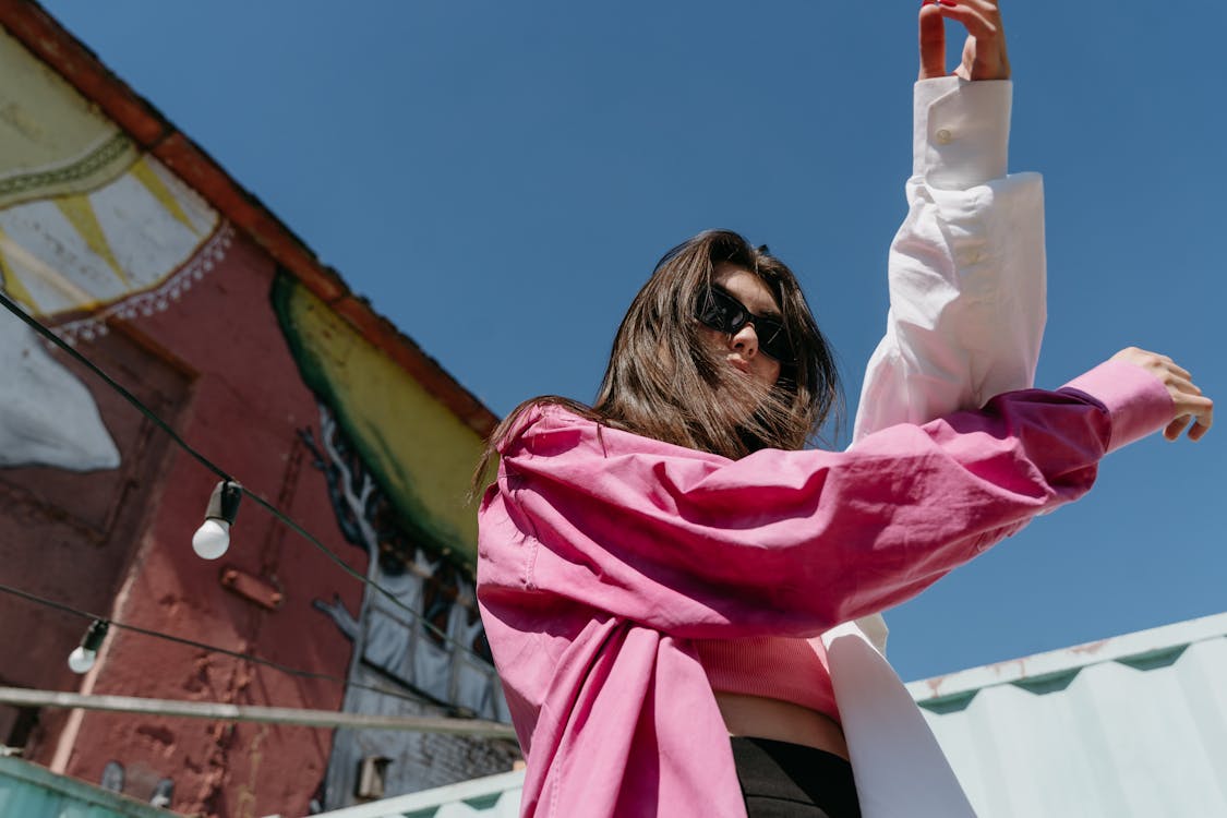 A Woman in Pink and White Long Sleeves