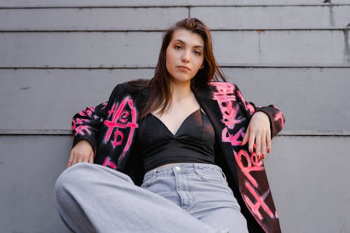 Alluring Woman in Black and Pink Jacket