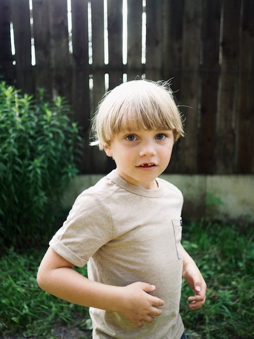 A Boy Wearing a Crew Neck T-Shirt