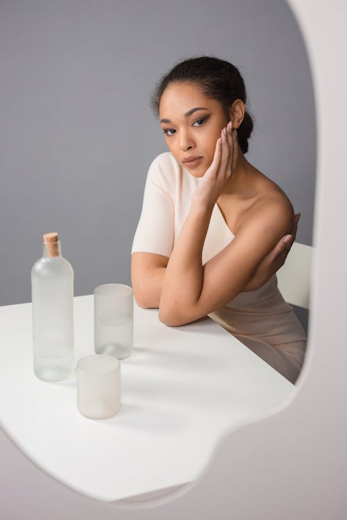 A Woman with Her Hand on Her Face