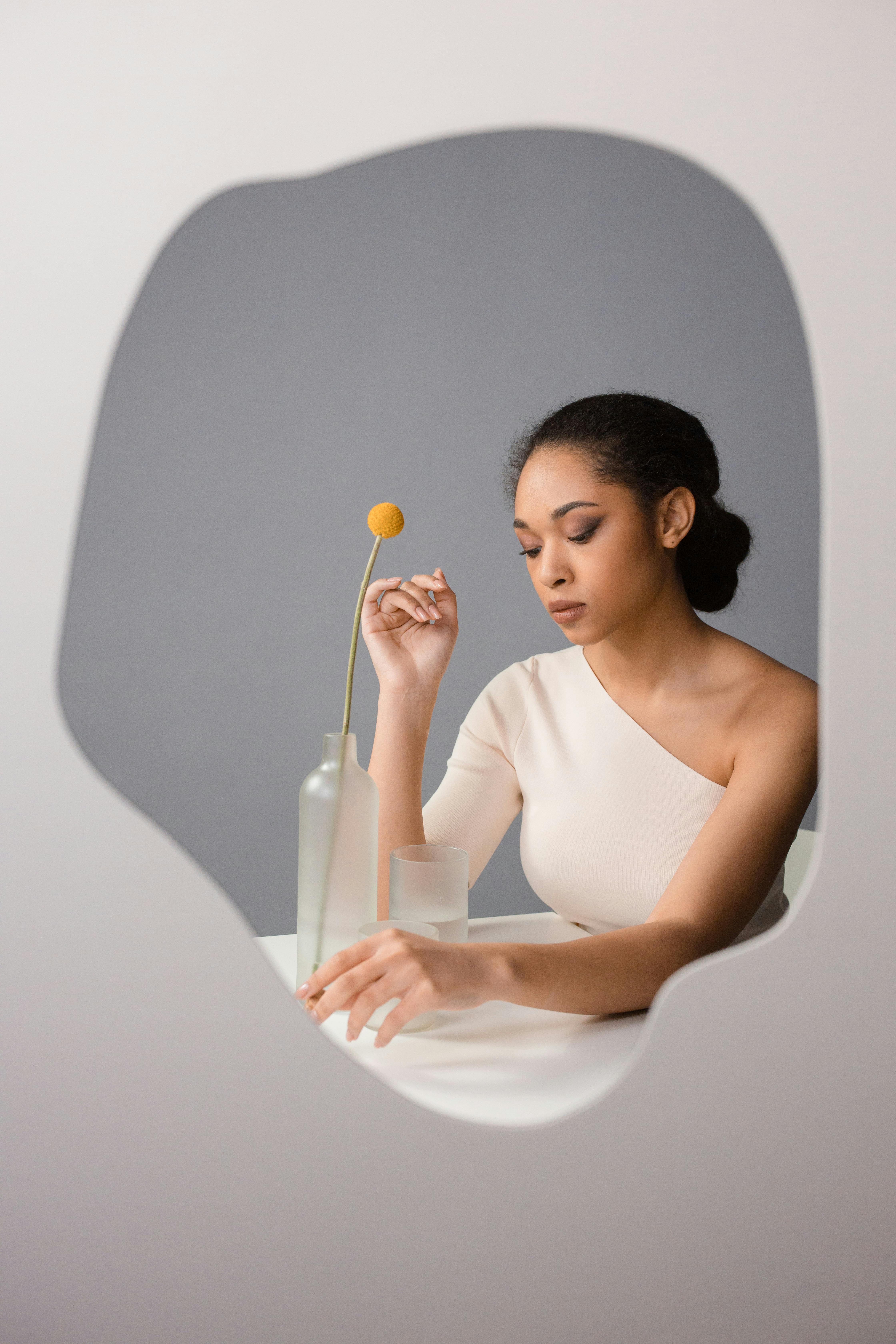 Woman's Reflection on a Mirror · Free Stock Photo