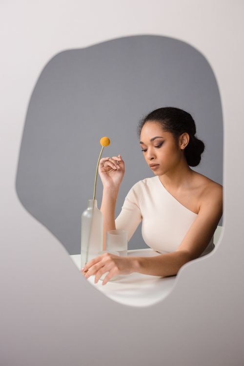 Woman's Reflection on a Mirror · Free Stock Photo