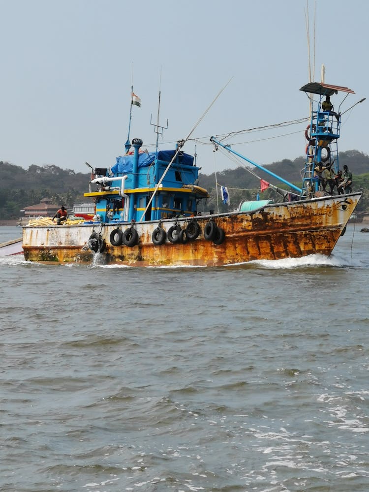 Rusty Ship On Sea