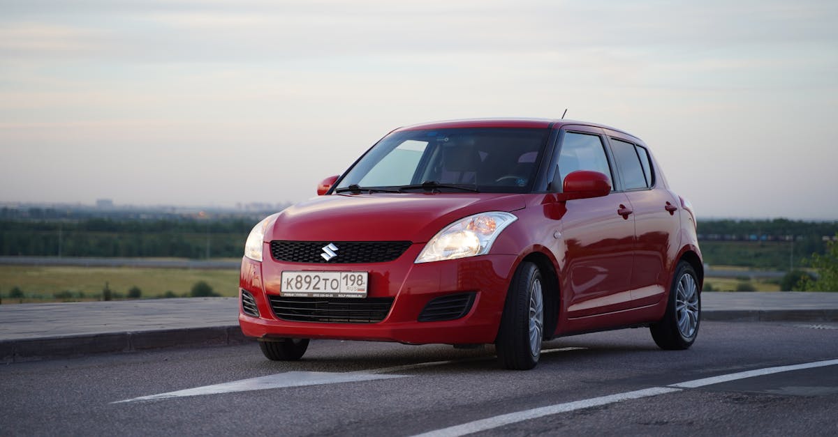 Red Suzuki Swift on the Road · Free Stock Photo Red Suzuki Swift on the Road · Free Stock Photo