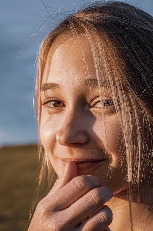 Smiling Young Woman With Blonde Hair 