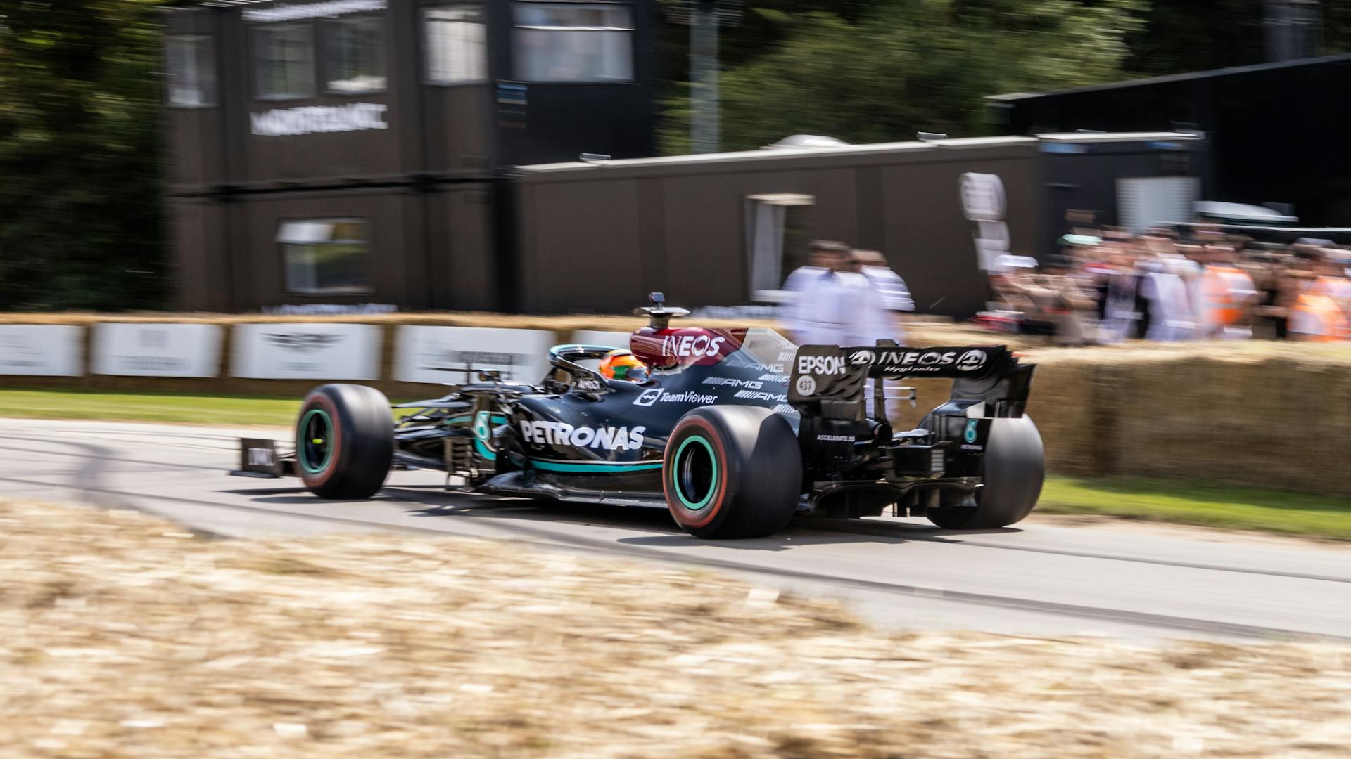 Lewis Hamilton Driving a Race Car on the Track for Mercedes AMG Petronas Formula 1 Team during a Grand Prix