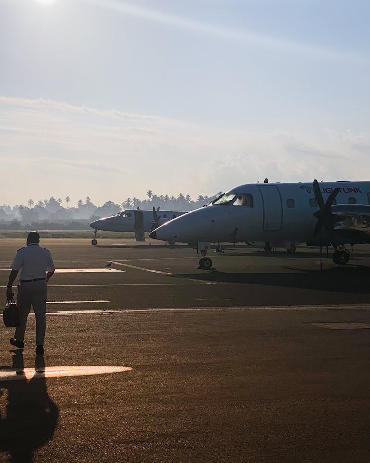 Airplanes On An Airstrip