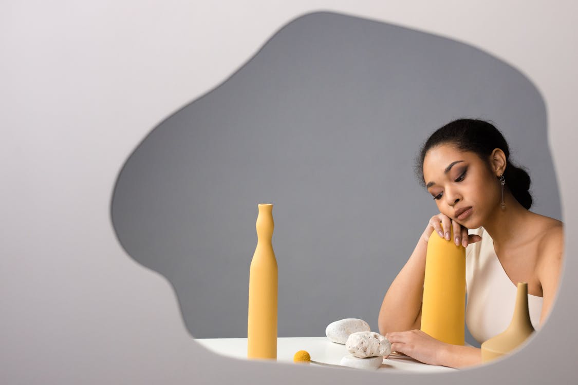 Pensive Woman and Ceramics Decorations