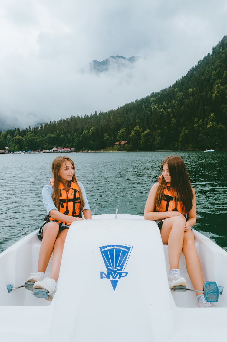 Girls On Pedal Boat In A Lake