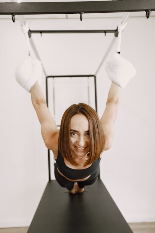 Free Woman Working Out at a Gym Stock Photo