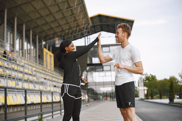 Joggers Doing A High Five