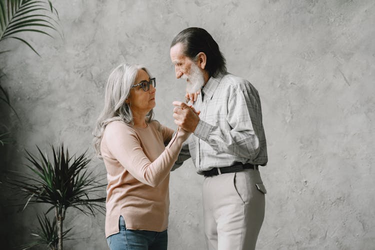 Elderly Couple Dancing Together