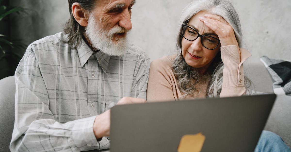 Calm Caregiver Providing Repetitive Answers To An Elderly Person With A Confused Expression