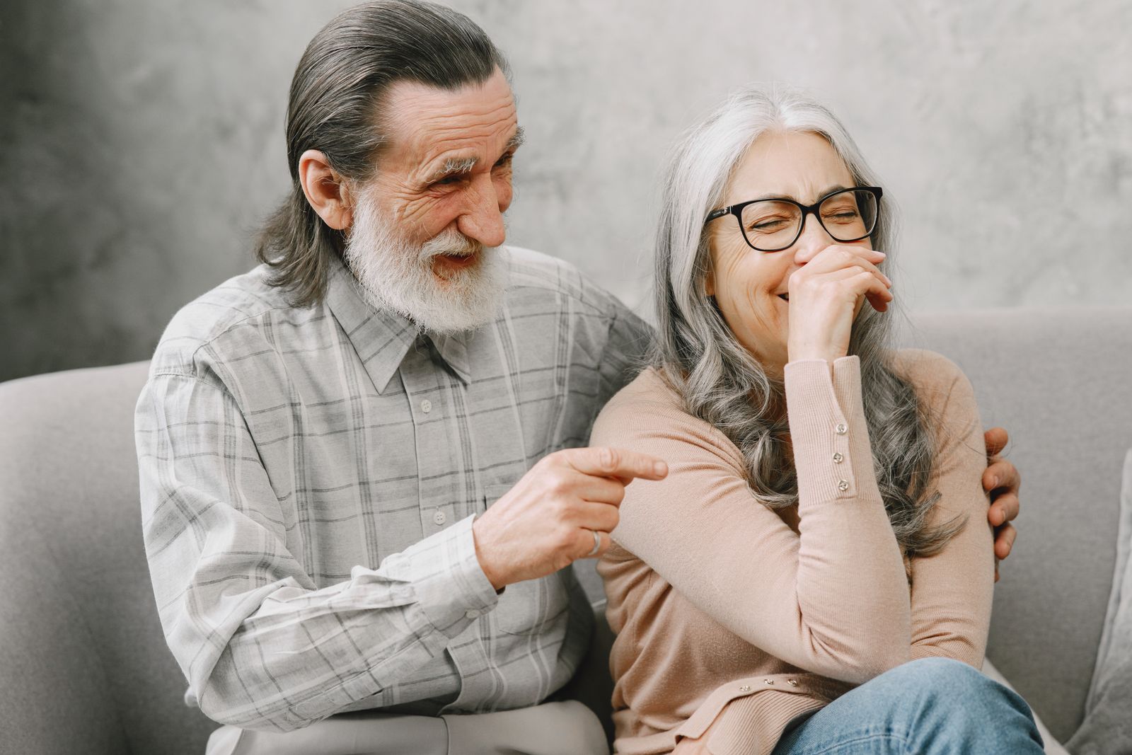 A happy elderly couple sharing a warm moment together