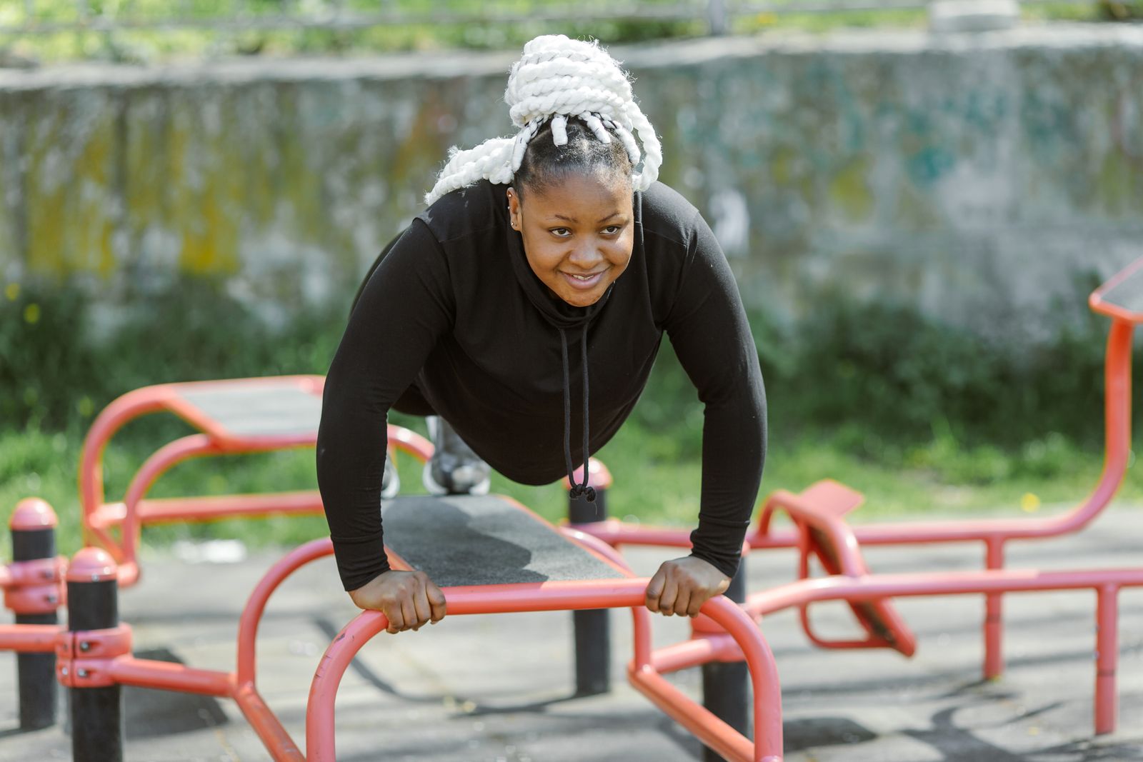 Plus-size woman confidently working out during a fitness session