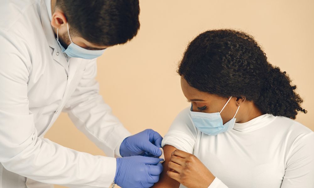 traveler receiving vaccination clinic