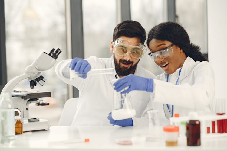 Man And Woman Surprised In Laboratory