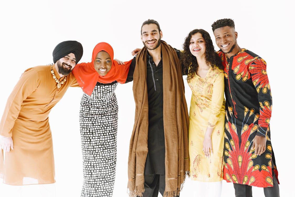 Young People From Different Cultures Wearing Their Traditional