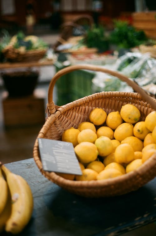 Free Lemon Fruits in a Brown Woven Basket Stock Photo