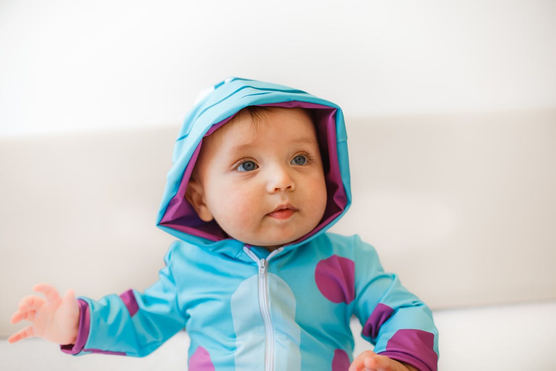 Close-Up Shot of a Cute Baby in Costume · Free Stock Photo