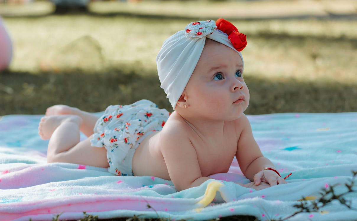 Free Cute Baby Lying on a Blanket Stock Photo